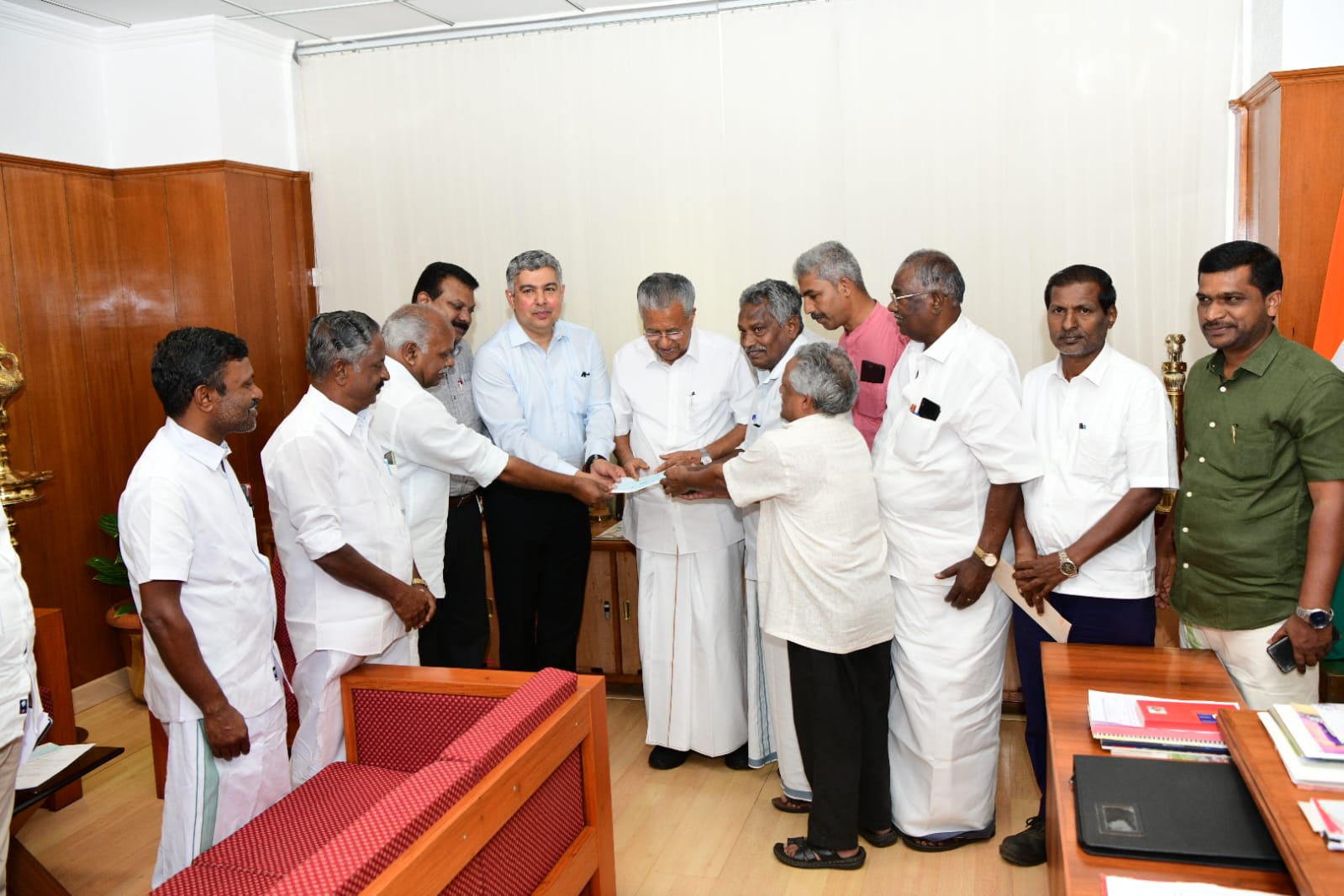 Munnar Plantation Workers and Corporate Support for Wayanad Landslide Victims In a significant display of solidarity and corporate responsibility, Tata Consumer Products Limited (TCPL) and Kanan Devan Hills Plantation Company (KDHP) have come forward to support the rehabilitation efforts for the victims of the devastating landslide in Wayanad. The contribution, amounting to ₹1,57,74,000, has been directed to the Chief Minister's Relief Fund, underlining the commitment of both companies and their employees to aid those affected by the disaster. Breakdown of Contributions: The total contribution was meticulously structured to ensure maximum impact: Employee Contributions: The plantation workers, supervisors, non-staff, staff, and employees in the Manoj maintenance category from TCPL and KDHP in Munnar collectively raised ₹57,74,000. This sum was amassed through the generous contribution of one day’s wages by each worker, a decision taken unanimously by the joint unions at Thottam Yemakhala in Munnar. This act of selflessness by the workers reflects their deep empathy and concern for the disaster-stricken communities in Wayanad. Corporate Contributions: TCPL contributed ₹50,00,000 as part of its ongoing commitment to social welfare and community support. KDHP matched this amount with an additional ₹50,00,000, further demonstrating the company's dedication to supporting broader humanitarian causes. The formal handover of the funds took place in Thiruvananthapuram, where KDHP Managing Director Mathew Abraham presented the total contribution to Kerala Chief Minister Pinarayi Vijayan. The ceremony was attended by KDHP Corporate Affairs Head, Deputy General Manager Prince Thomas George, and representatives of various unions, including K.V Sasi, A.K Mani, and M.Y Ouseph. Their presence underscored the collaborative effort between the company’s management and its workforce in supporting this crucial cause. A Collective Effort for Rehabilitation: The decision by the plantation workers and employees to contribute one day’s wages speaks volumes about the strong sense of community within the Munnar plantation sector. Their collective action, coupled with the significant contributions from TCPL and KDHP, highlights the unity and shared responsibility felt across all levels of the organization. These funds will be instrumental in providing immediate relief and supporting the long-term rehabilitation of those affected by the landslide in Wayanad. The contribution reflects not only a financial commitment but also a moral one, as the people of Munnar stand in solidarity with their neighbors in Wayanad during this challenging time. Looking Forward: This substantial donation by TCPL, KDHP, and their employees is expected to make a meaningful difference in the lives of those affected by the Wayanad disaster. It is a powerful example of how corporate entities and their workforce can come together to support communities in times of need. As the relief efforts continue, the collaborative spirit shown by the workers and management of Munnar’s plantations will undoubtedly inspire others to contribute to the rebuilding of Wayanad. The funds will be utilized under the guidance of the Chief Minister’s office to address the most pressing needs of the disaster victims, ensuring that the affected families can rebuild their lives with dignity and hope. This initiative reaffirms the role of responsible corporate citizenship and the impact of collective action in addressing societal challenges, particularly in times of crisis. The Munnar plantation sector, led by KDHP and TCPL, has set a commendable example of how unity and compassion can drive positive change, providing a beacon of hope for the communities in Wayanad.This article seeks to encapsulate the heartfelt efforts of the Munnar plantation workers, TCPL, and KDHP in supporting the rehabilitation of Wayanad's disaster victims. The contributions made will significantly aid in the ongoing relief efforts and serve as a testament to the power of collective action.